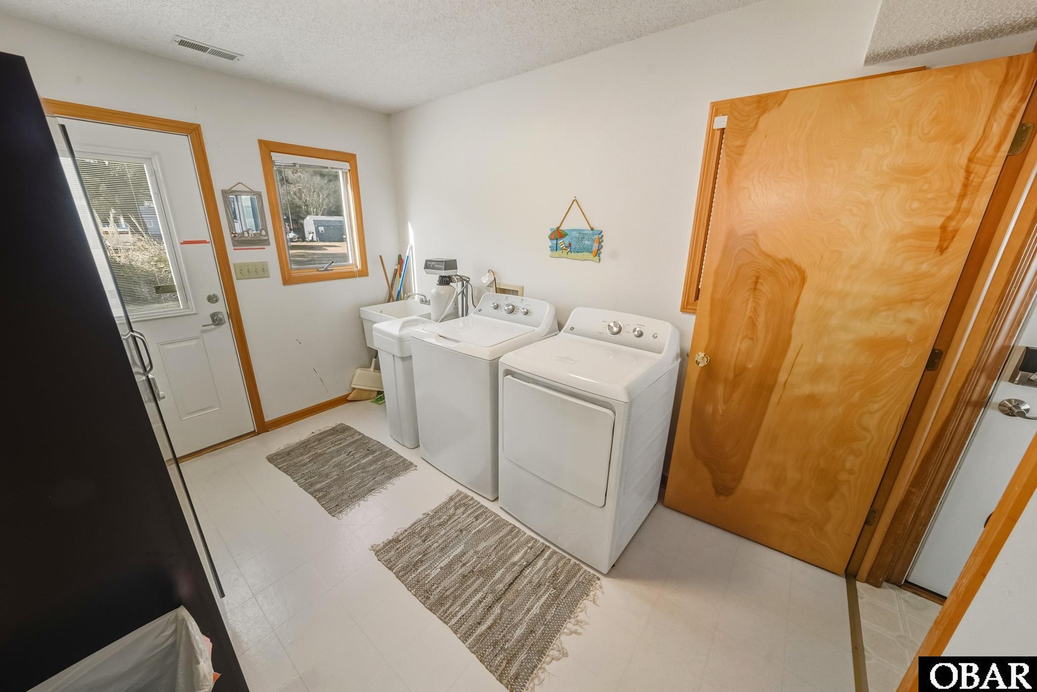 105 North Water Street Point Harbor, NC 27964 - Photo 21 of 50 Exterior Door