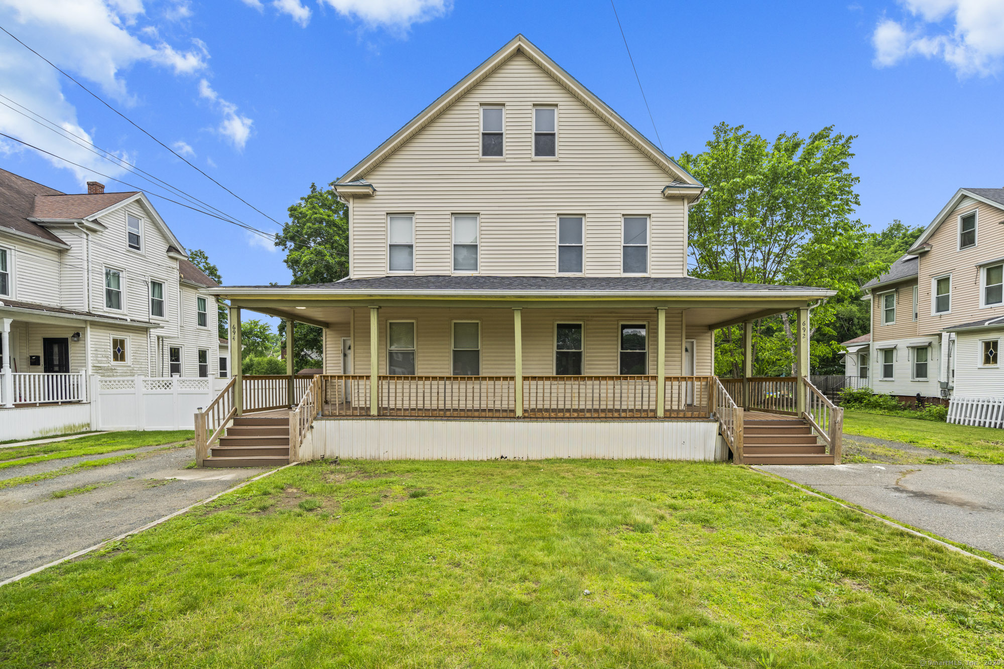 692 Enfield Street Enfield, CT 06082 - Photo 1 of 1 a front view of a house with a yard