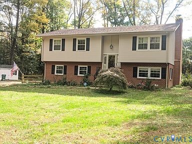 1007 Ethelwood Road Glen Allen, VA 23059 - Photo 1 of 21 a front view of a house with a yard