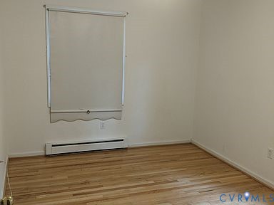 1007 Ethelwood Road Glen Allen, VA 23059 - Photo 14 of 21 an empty room with wooden floor