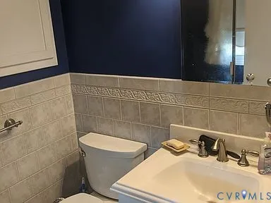 a bathroom with a sink and a toilet