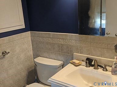 1007 Ethelwood Road Glen Allen, VA 23059 - Photo 18 of 21 a bathroom with a sink and a toilet
