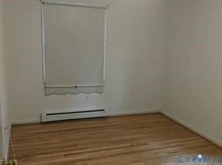 a view of a backyard with trees