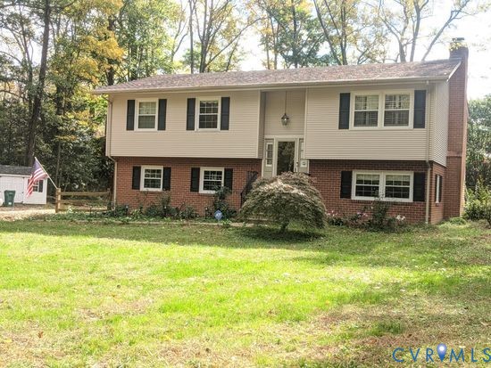 1007 Ethelwood Road Glen Allen, VA 23059 - Photo 2 of 21 a front view of a house with a yard
