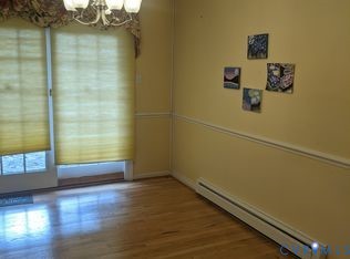 1007 Ethelwood Road Glen Allen, VA 23059 - Photo 6 of 21 a view of a small space with wooden floor and a window