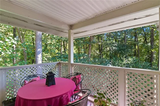 a outdoor dining space with furniture and outdoor view