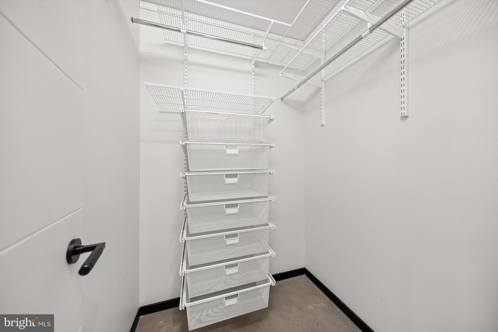 1530 Key Boulevard, Unit 125 Arlington, VA 22209 - Photo 13 of 27 Customizable Elfa closet systems throughout