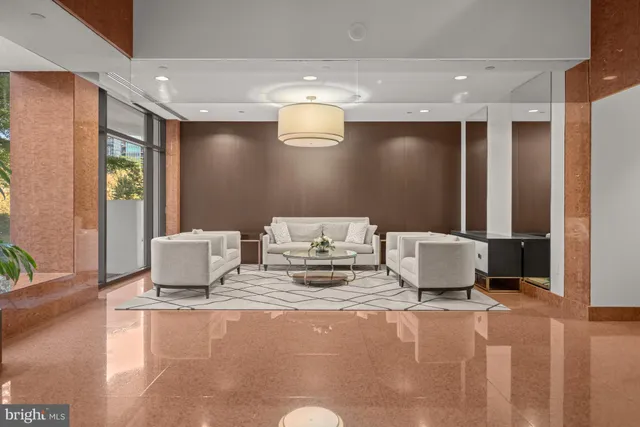 a living room with furniture and window