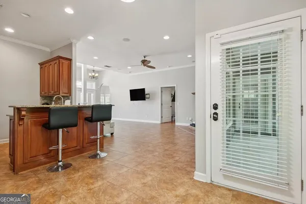 a view of kitchen with furniture and a table