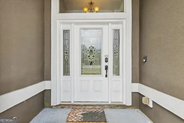 a view of a entryway door of the house