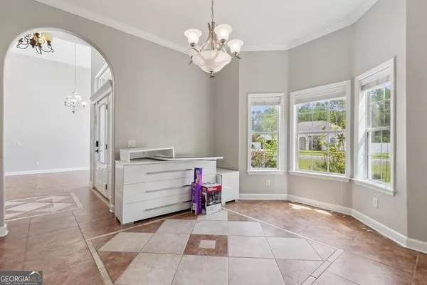 a view of hallway with a front door