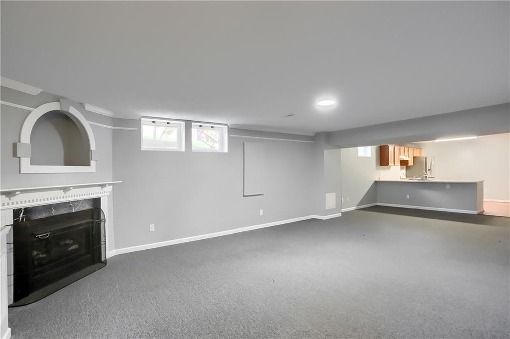 1075 Rural Ridge Drive Cheswick, PA 15024 - Photo 20 of 25 Wow, entertain in the finished lower level. This versatile space provides generous room for anything you need.