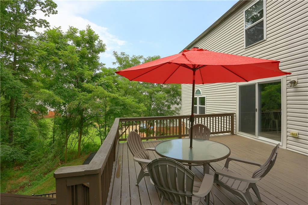 1075 Rural Ridge Drive Cheswick, PA 15024 - Photo 24 of 25 The rear deck overlooks the wooded yard.