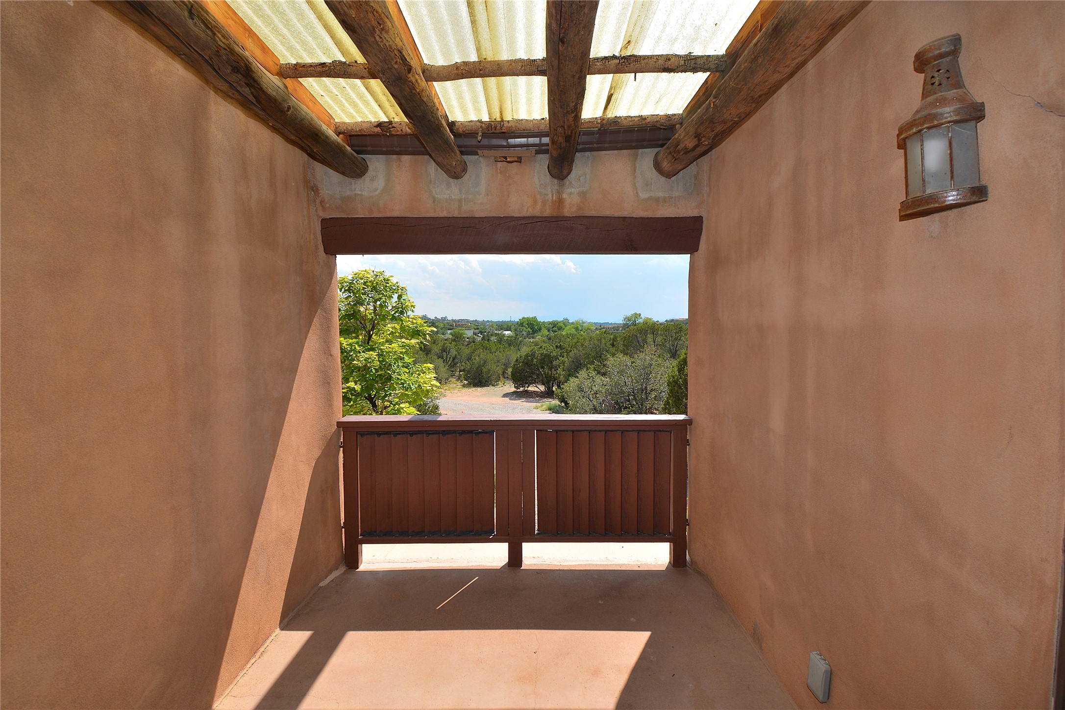 904 Bishops Lodge Road Santa Fe, NM 87501 - Photo 10 of 51 Small deck off upstairs dining room