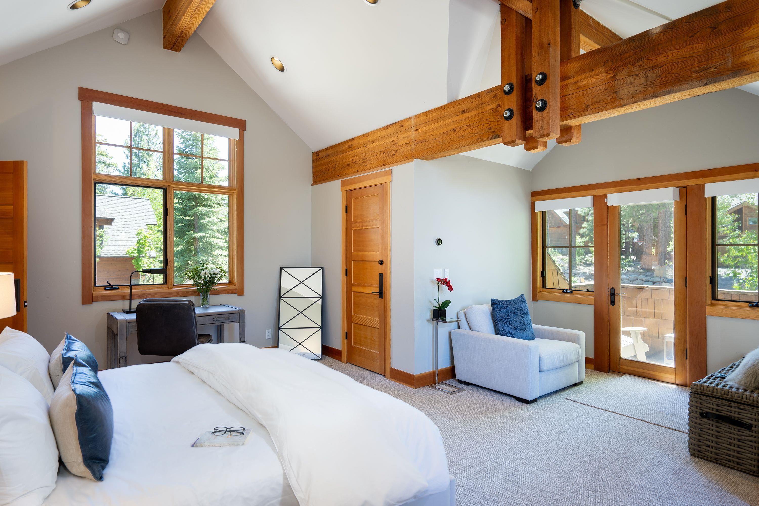 1723 Grouse Ridge Road Truckee, CA 96161 - Photo 13 of 27 a bedroom with bed and a large window