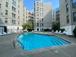 an aerial view of a house with swimming pool
