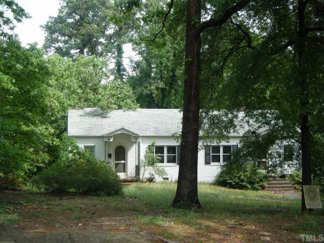 3030 Farrior Road Raleigh, NC 27607 - Photo 1 of 7 a front view of a house with a garden