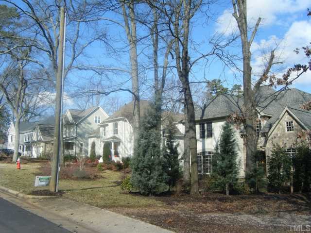 3030 Farrior Road Raleigh, NC 27607 - Photo 5 of 7 a view of a building with a yard