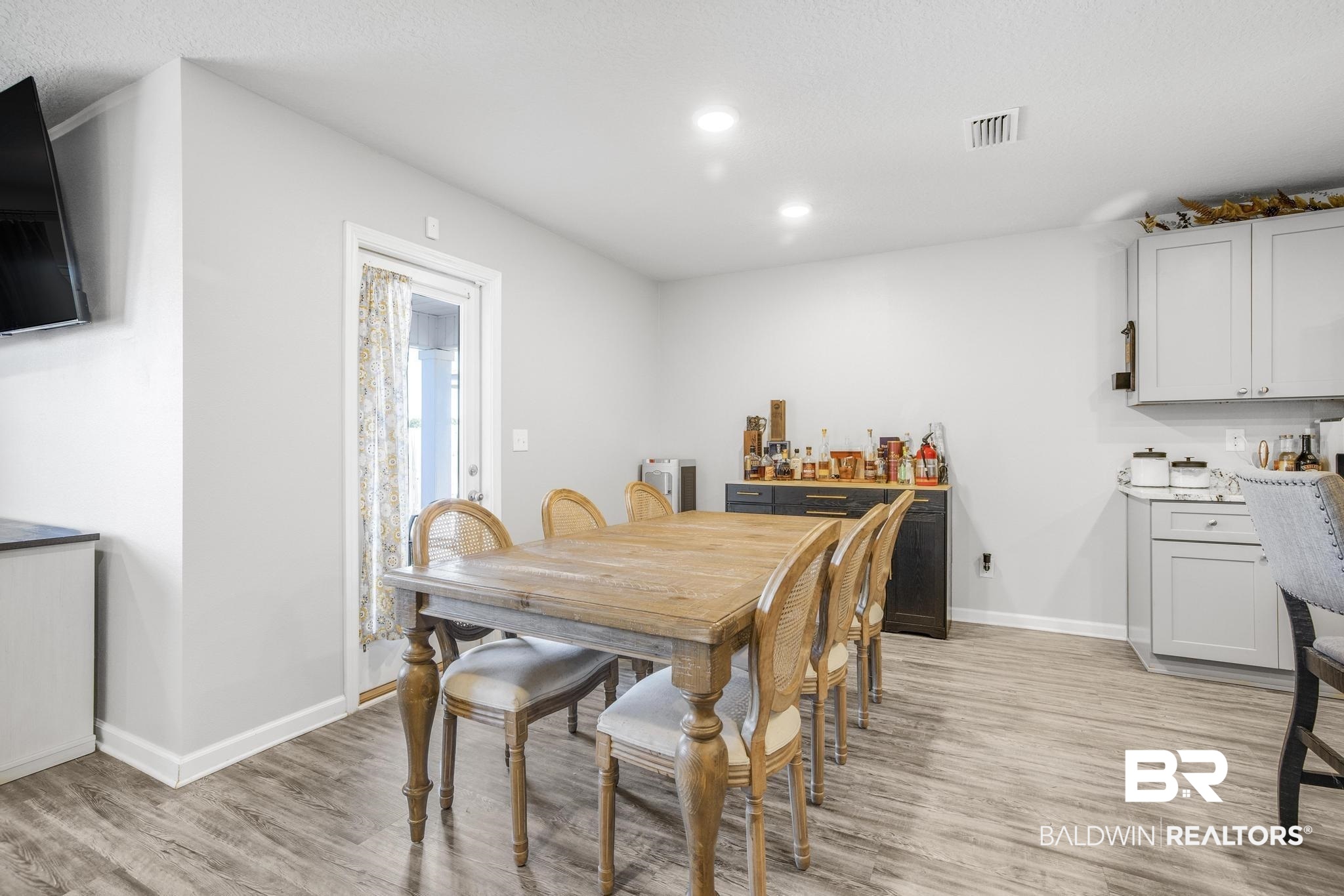 10738 Ridgeview Drive Mobile, AL 36608 - Photo 11 of 48 Dining room with light wood-style flooring and recessed lighting