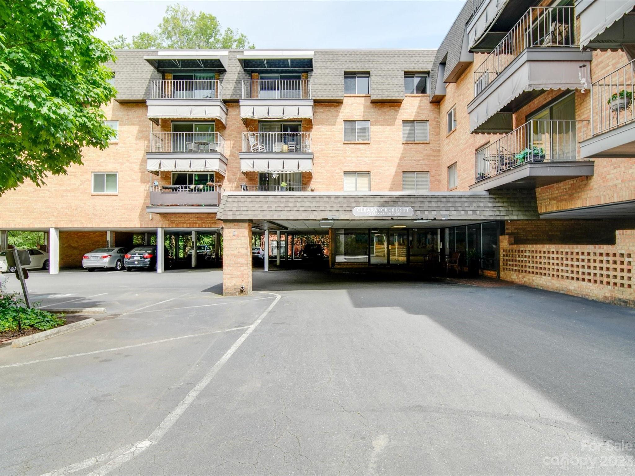 a view of a building with a street