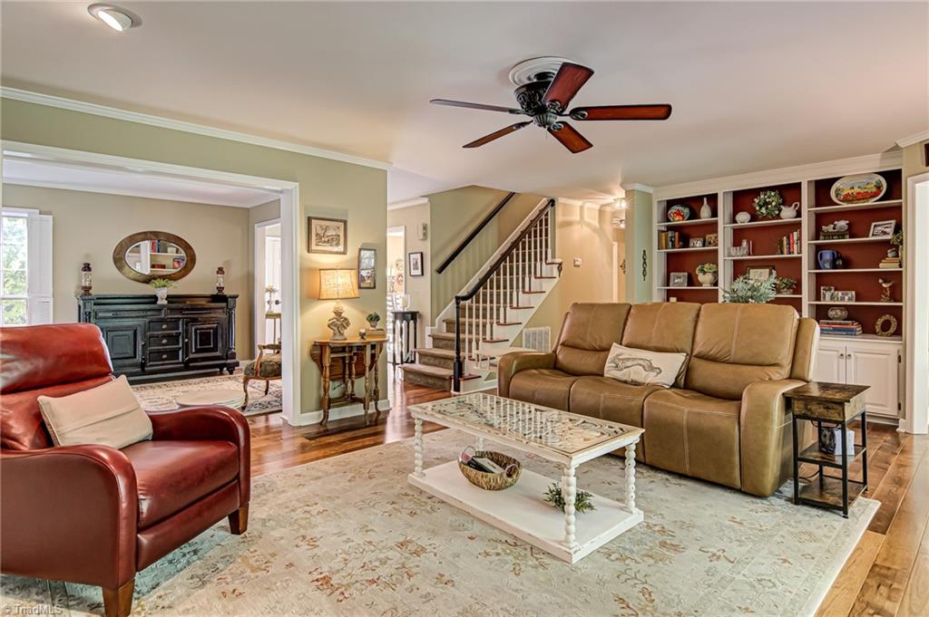 8065 Lasater Road Clemmons, NC 27012 - Photo 11 of 39 Den with built in bookcases and cabinets