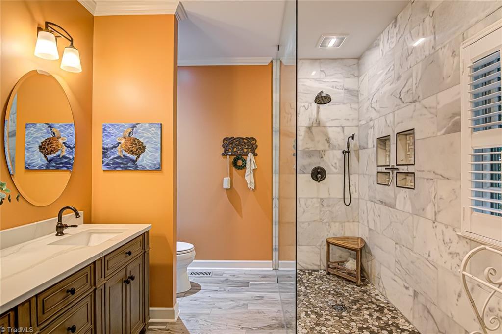 8065 Lasater Road Clemmons, NC 27012 - Photo 21 of 39 Renovated main level bath with zero entry shower