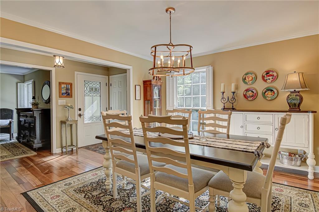 8065 Lasater Road Clemmons, NC 27012 - Photo 5 of 39 Dining Room with view through the foyer to the library