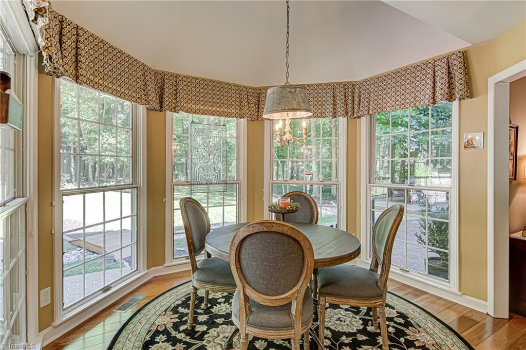8065 Lasater Road Clemmons, NC 27012 - Photo 8 of 39 Breakfast area overlooking the backyard