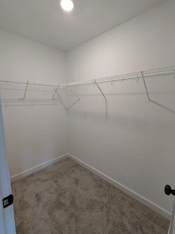 a view of a room with racks on the wall