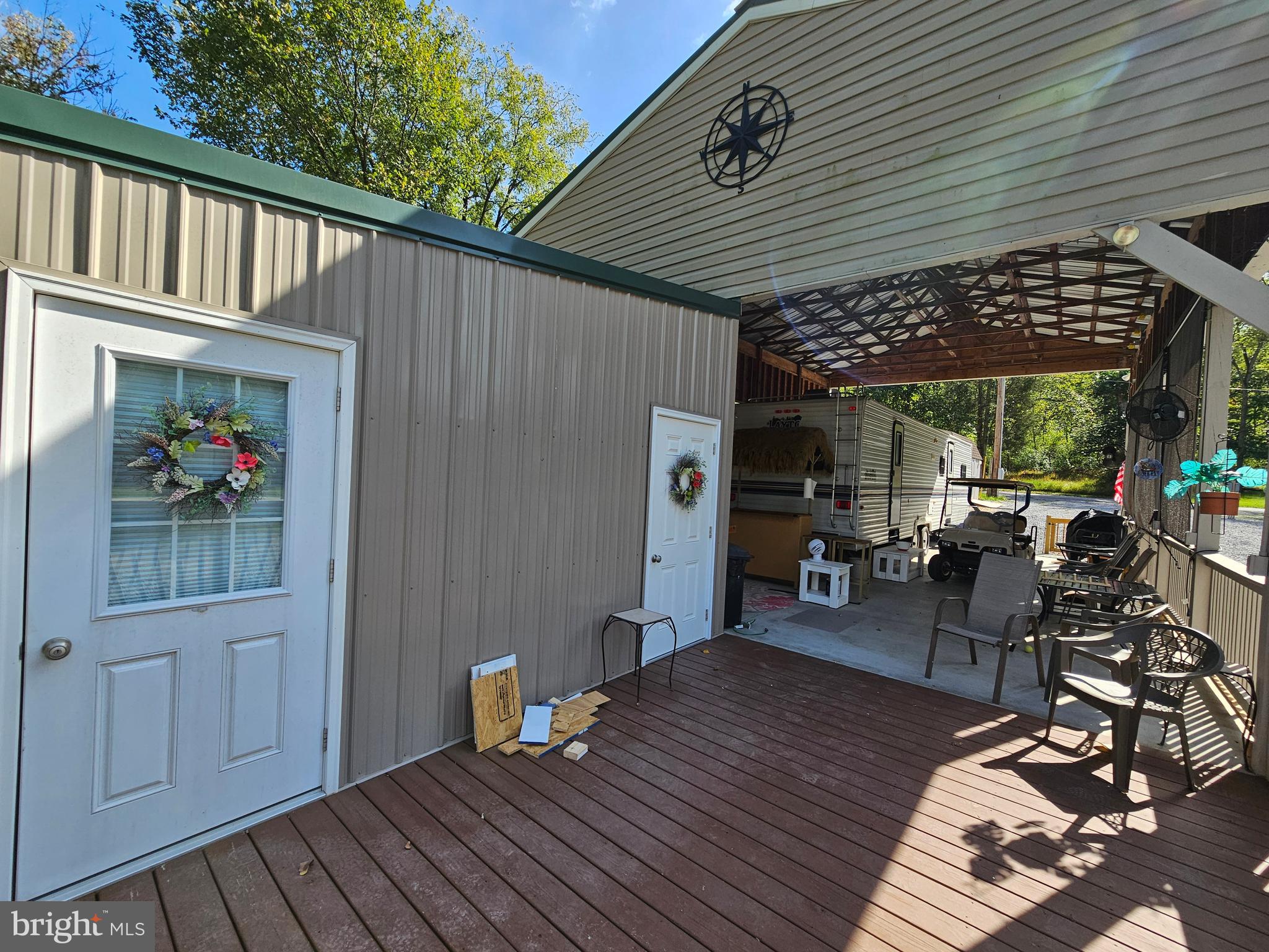56 Boo Boo Boulevard Falling Waters, WV 25419 - Photo 14 of 48 an outdoor space with seating