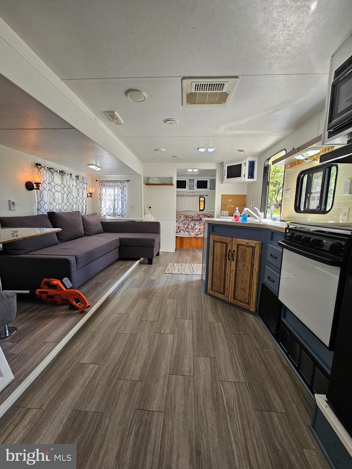 56 Boo Boo Boulevard Falling Waters, WV 25419 - Photo 31 of 48 a living room with furniture and a fireplace
