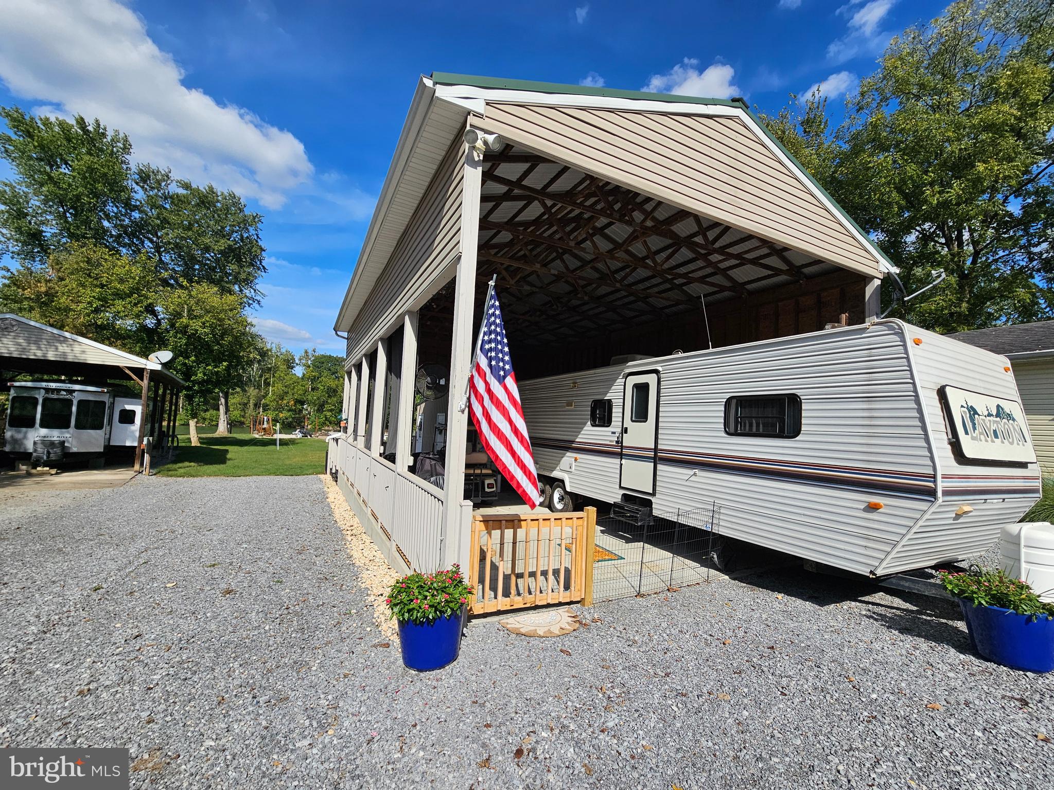 56 Boo Boo Boulevard Falling Waters, WV 25419 - Photo 8 of 48 a front view of house with sign board