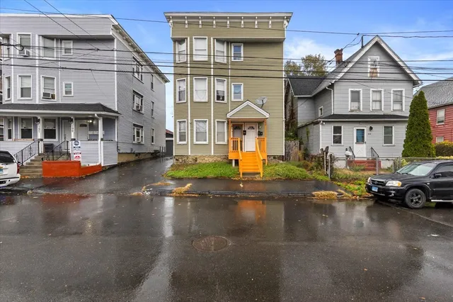 a view of a street with cars