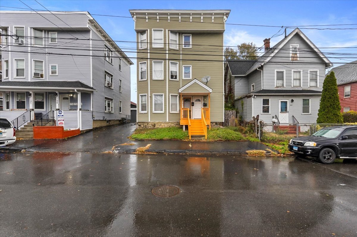 a view of a street with cars
