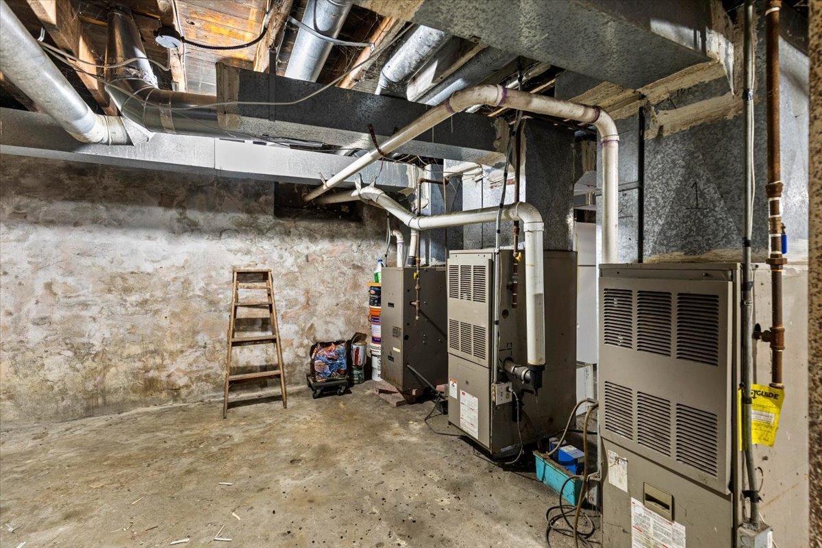205 Smith Street Bridgeport, CT 06607 - Photo 26 of 28 a view of a storage room with wooden walls