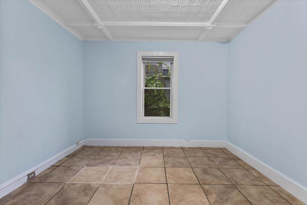 205 Smith Street Bridgeport, CT 06607 - Photo 8 of 28 an empty room with a window