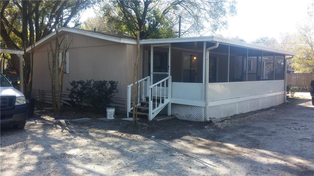 1513 Sinclair Hills Road Lutz, FL 33549 - Photo 1 of 1 Front house