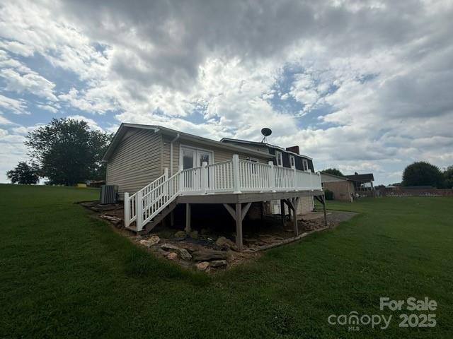 2205 Olde Well Road Hudson, NC 28638 - Photo 21 of 23 a view of a house with a backyard
