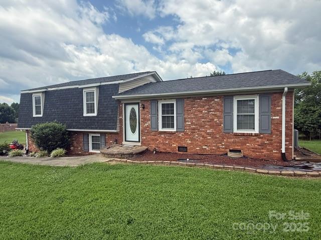 2205 Olde Well Road Hudson, NC 28638 - Photo 3 of 23 a front view of house with yard and outdoor seating