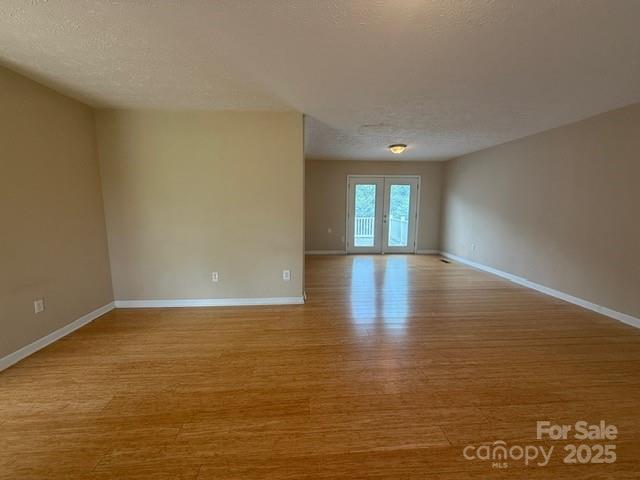 2205 Olde Well Road Hudson, NC 28638 - Photo 8 of 23 a view of an empty room and window