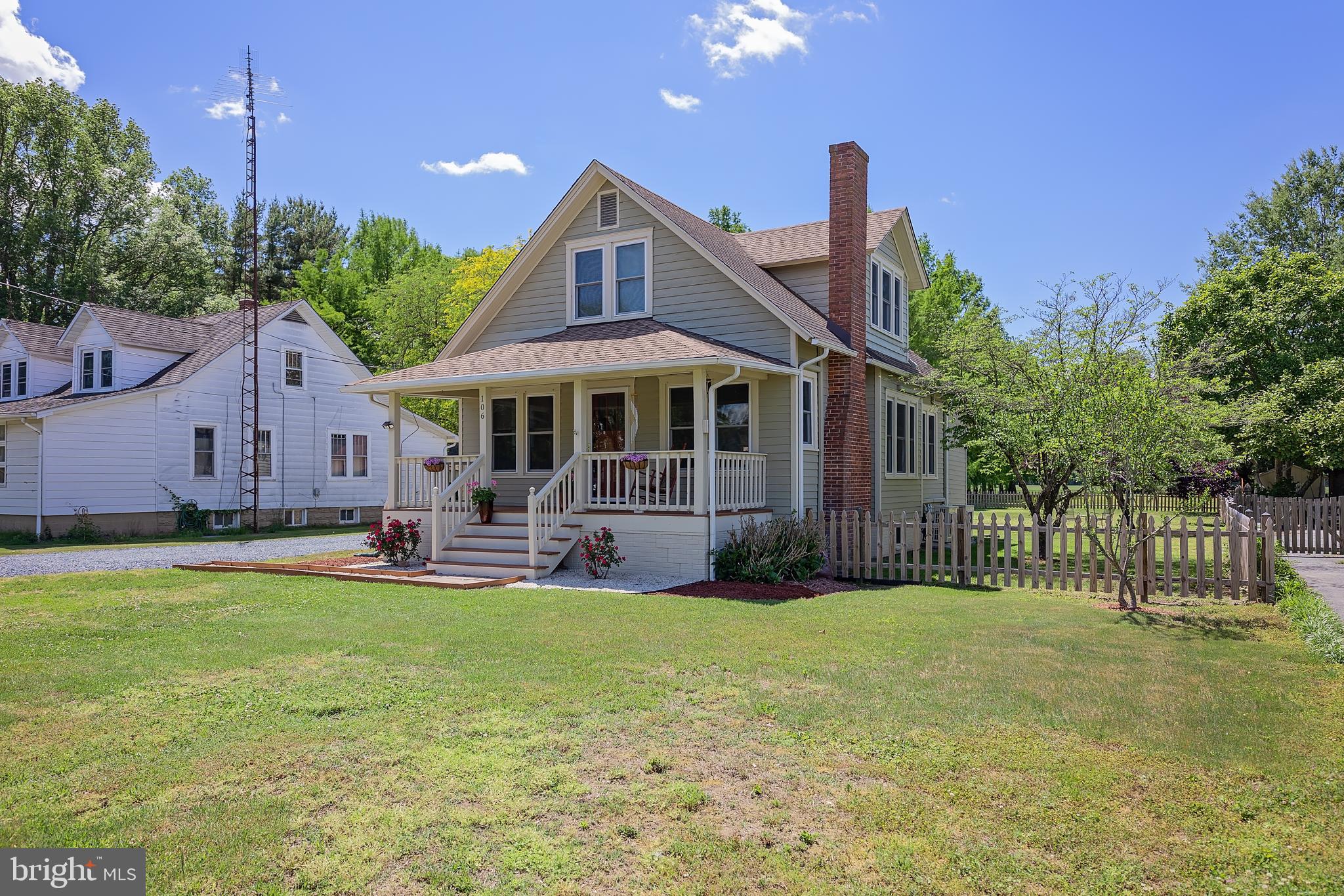 106 Main Street Preston, MD 21655 - Photo 1 of 31 a front view of a house with garden