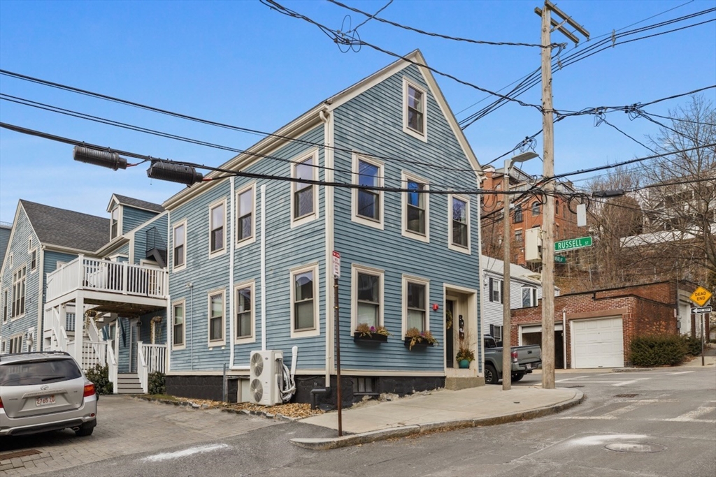 38 Mead Street, Unit 2 Boston, MA 02129 - Photo 13 of 14 a building that has a sign on it
