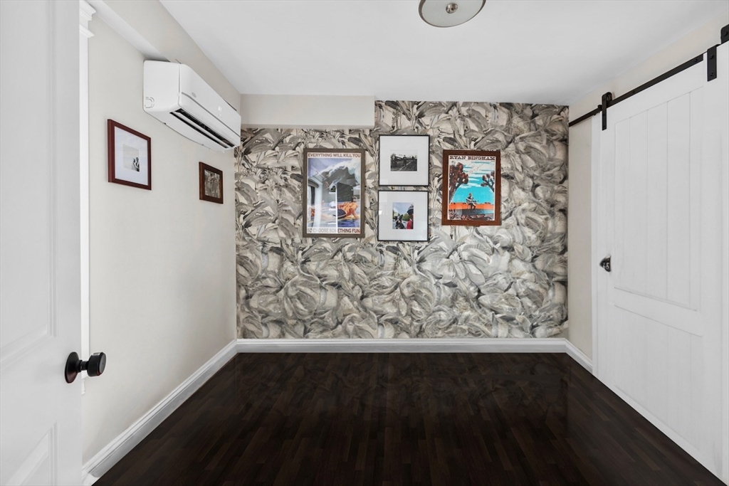 38 Mead Street, Unit 2 Boston, MA 02129 - Photo 9 of 14 a view of a hallway with wooden floor and cabinet