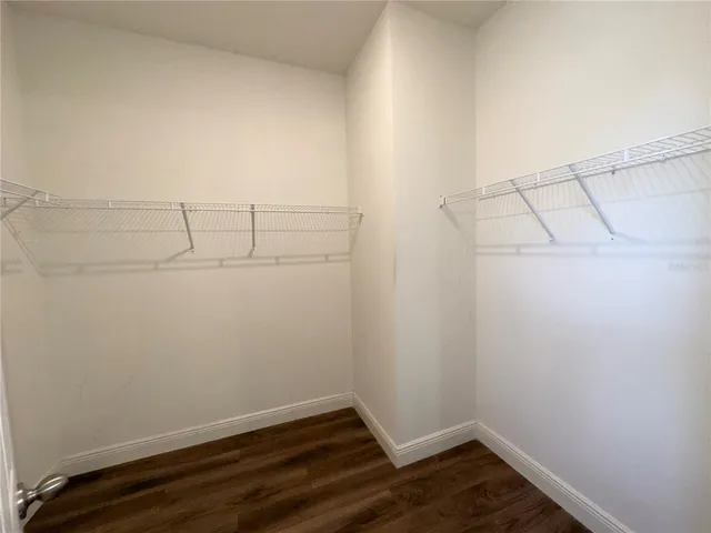 a view of a room with racks on the wall