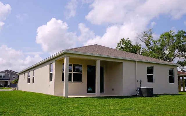 a front view of house with yard
