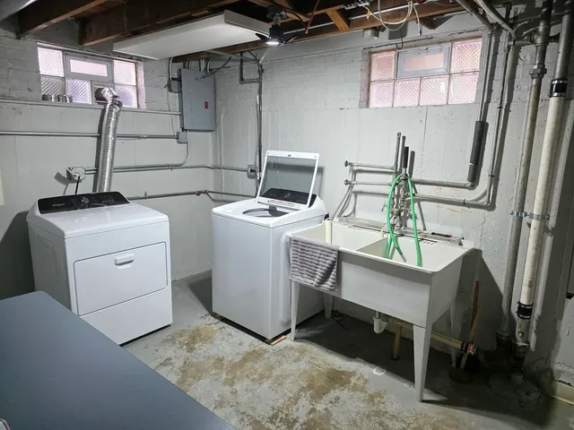 a utility room with dryer and washer