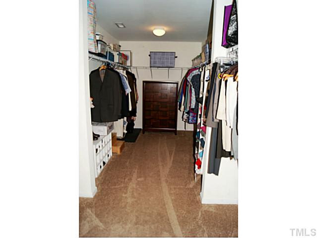 10412 Chandler Way Raleigh, NC 27614 - Photo 17 of 22 The master closet is enormous!! There is even more space behind the photographer! Master Suite