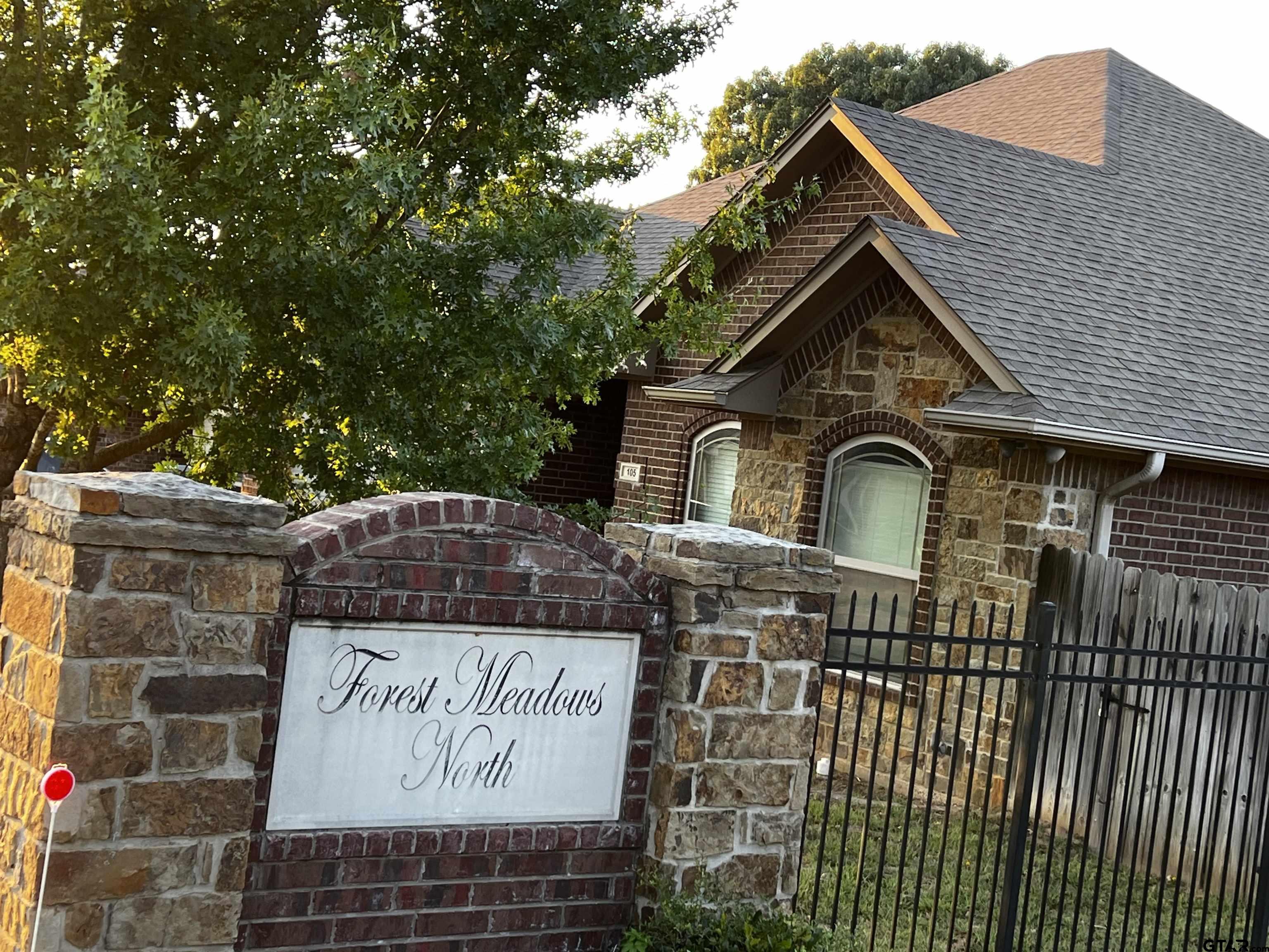 112 Letha Court Tyler, TX 75702 - Photo 19 of 45 a front view of a house with a garden