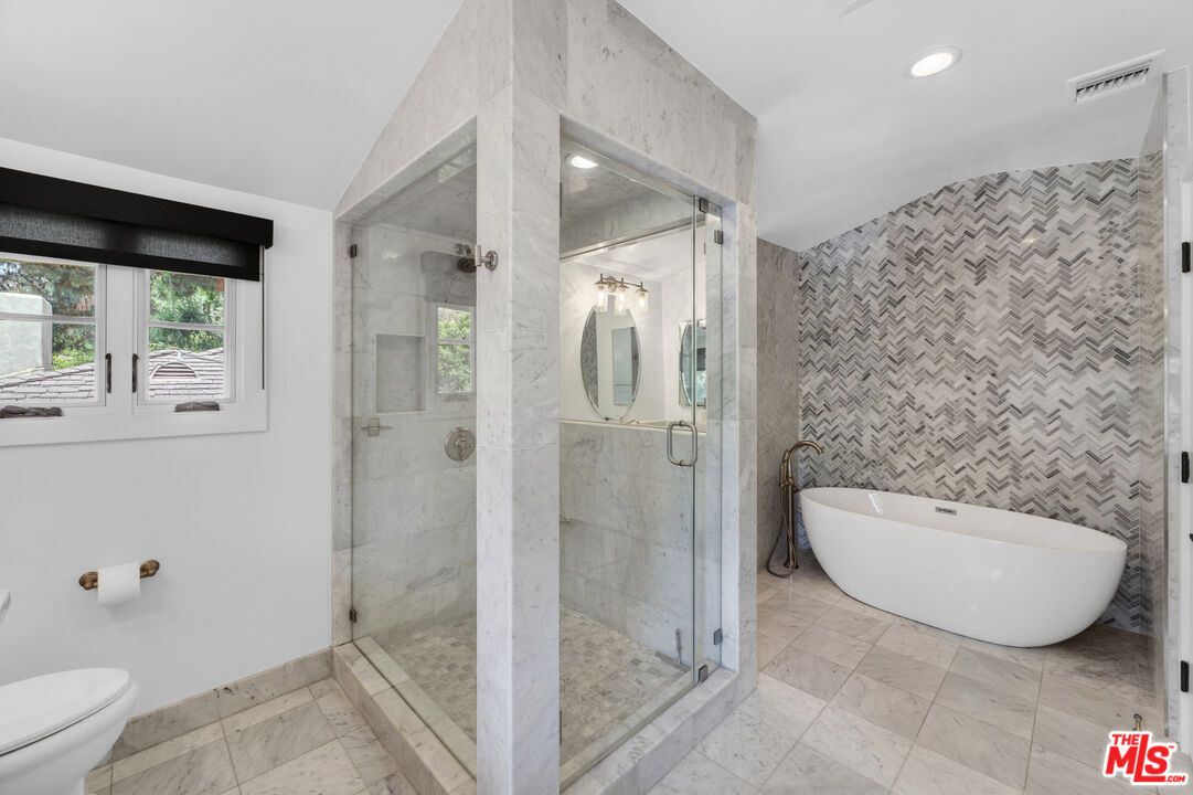 760 South San Rafael Avenue Pasadena, CA 91105 - Photo 31 of 45 a bathroom with a sink toilet and shower