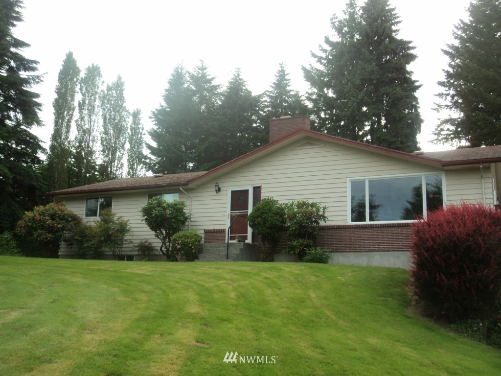 1010 Shorey Road Chehalis, WA 98532 - Photo 1 of 1 a view of a house with garden and yard